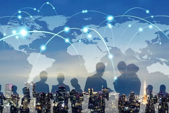 Silhouettes of business professionals over a world map with connected network lines, symbolizing global business communication, digital connectivity, and international collaboration.